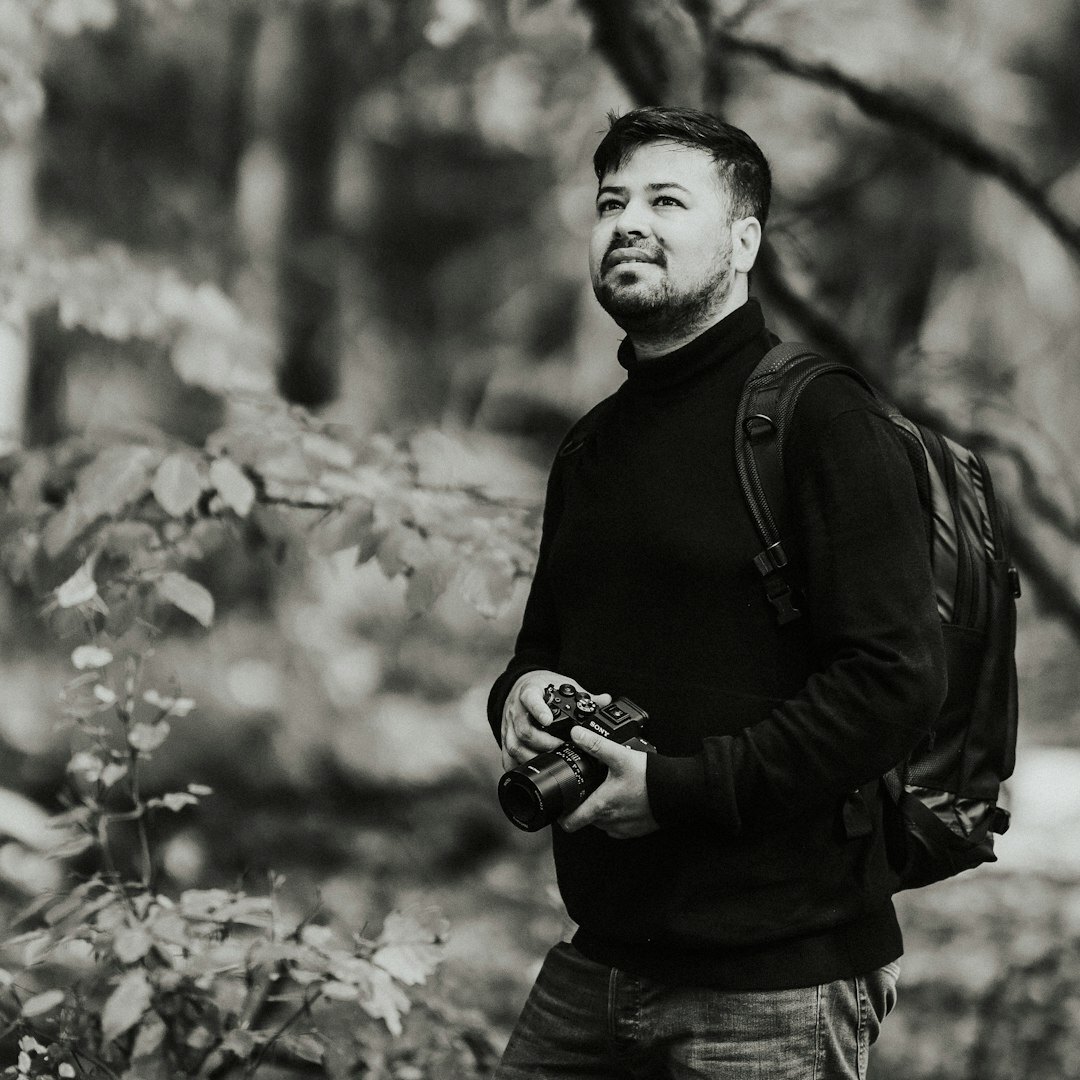 Portrait of a smiling Belgian man, video editing instructor