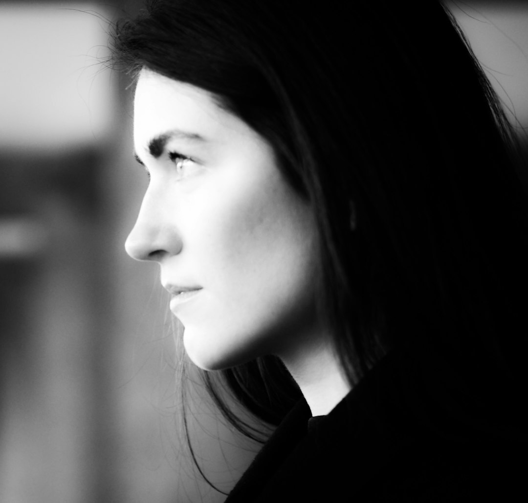 Portrait of a young Belgian woman, editorial workflow specialist