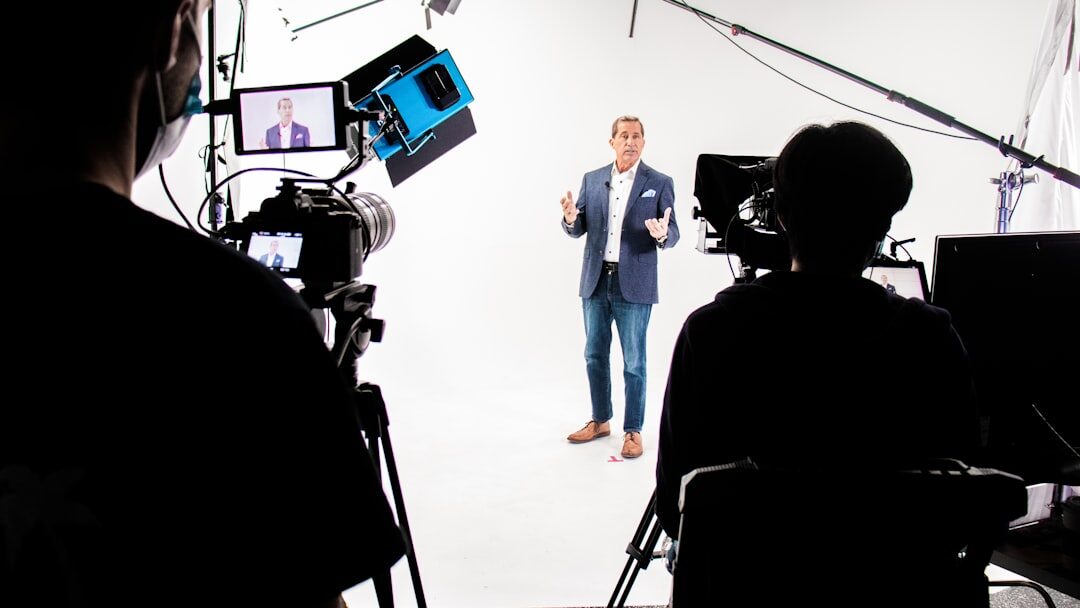 Professional broadcast camera on a tripod in a studio