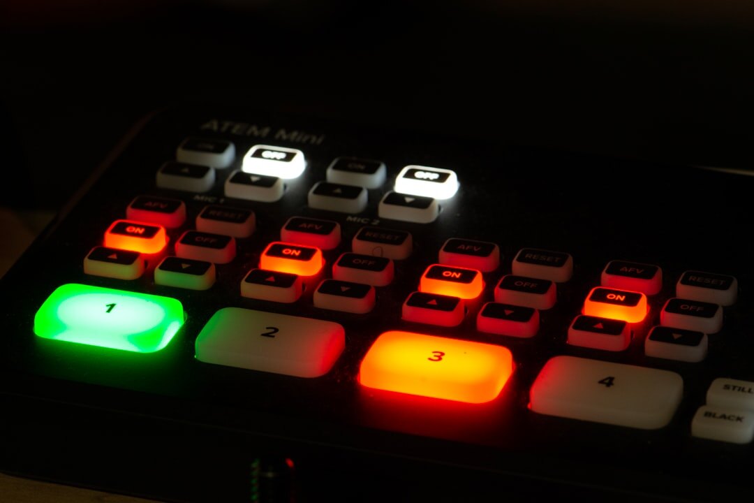 Vision mixer switcher panel with glowing buttons for live transitions